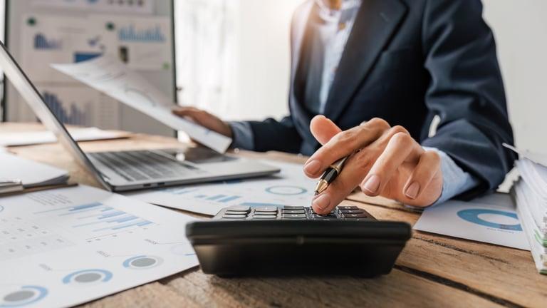 Small business owner reviewing business rates relief eligibility for their premises