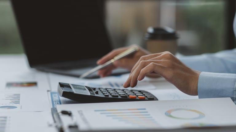 Business owner conducting a half-year financial review