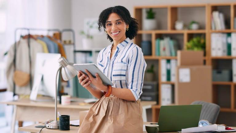 Business owner reviewing rising costs and protecting profit margins